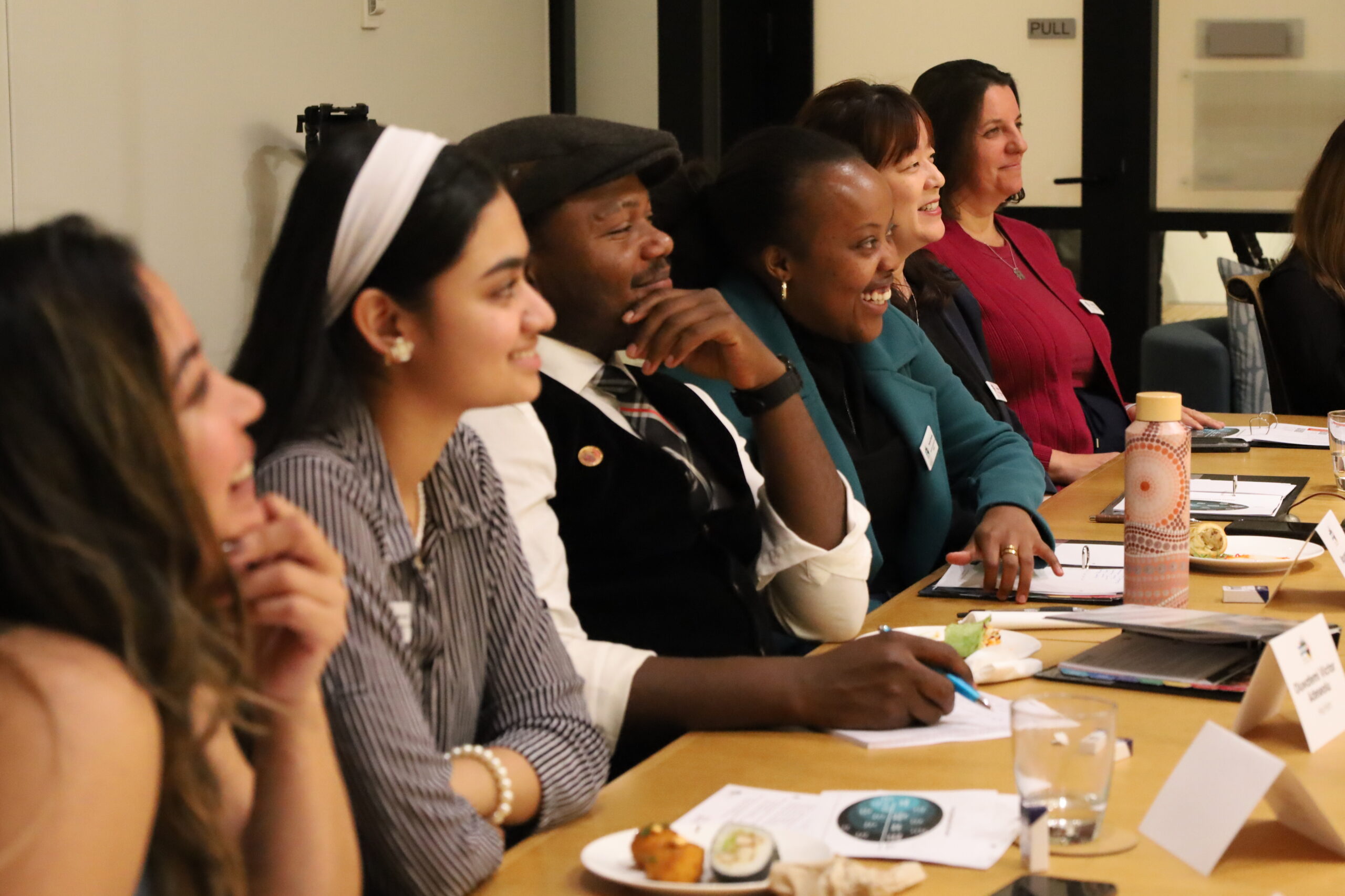 Participants watching Nilesh speak