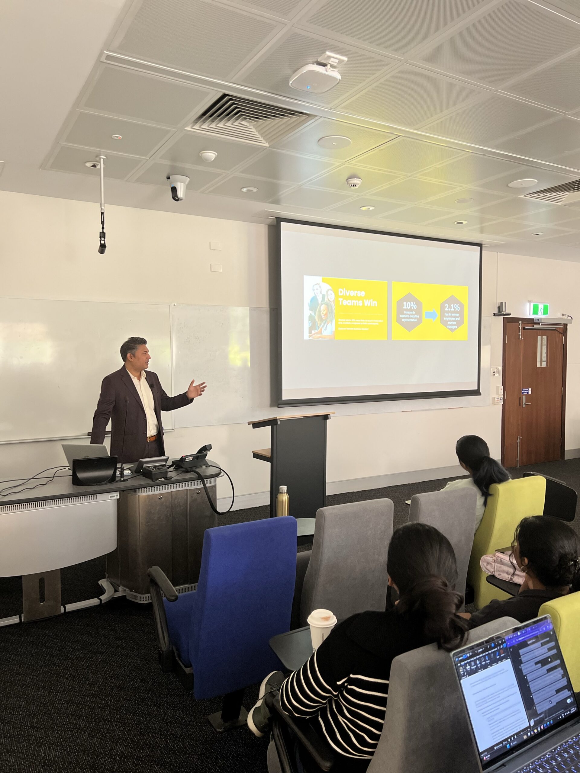 Nilesh Makwana delivering a presentation at UWA